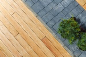 Wood Deck and Concrete Bricks Pavement in a Garden